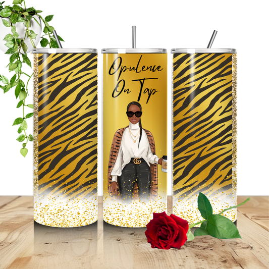 Opulence on Tap tumbler with tiger stripe design and a person in a stylish outfit. Unique Carper. I am Unique